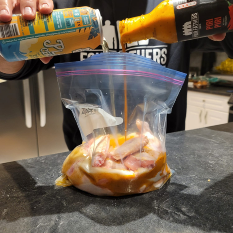 Marinade chicken wings with piri piri and beer